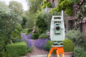 land surveying device directed toward residential property