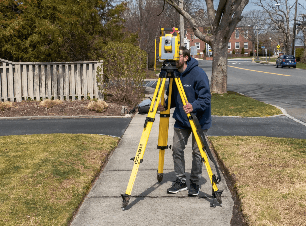 Property Line Markers in NYC Sidewalks Offer Crossing Only By