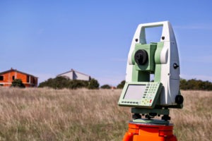land survey equipment in a field