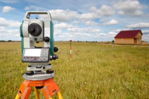 land survey equipment in a field