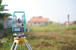 land survey equipment in field
